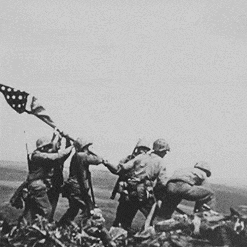 Veterans hoisting the Amerian flag