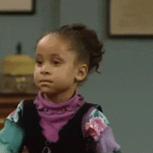 Young girl reacting with a disappointed expression, smacking her hand to her head