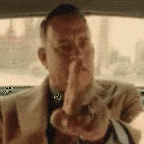 Man shaking his finger to say no