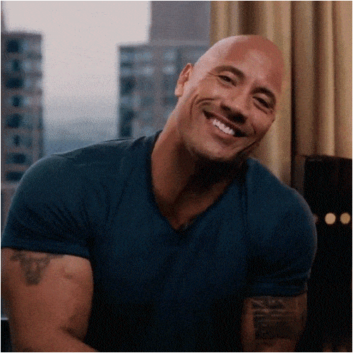 A smiling man in a dark T-shirt slowly shifts to an awkward, uncomfortable expression.