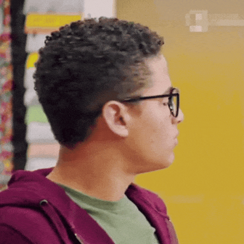 Young man in glasses making a suggestion