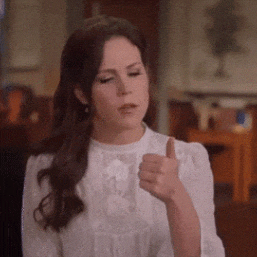 Person counting on their fingers while thinking carefully