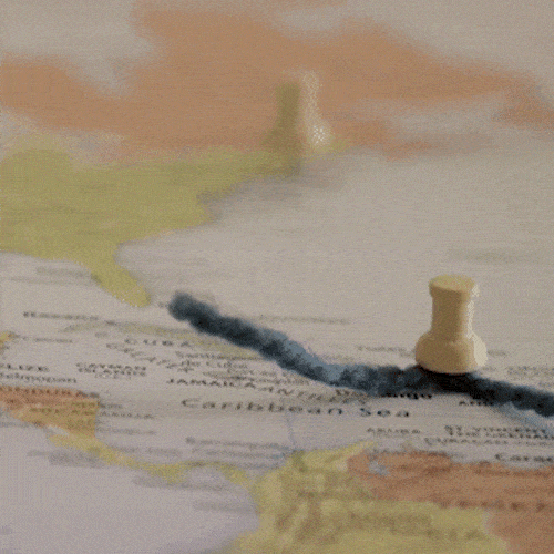 • Map with a pushpin and a marked route across a region