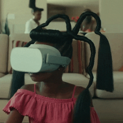 Child wearing a virtual reality headset indoors