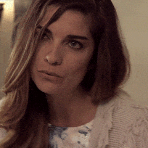 Woman with a skeptical, unimpressed look