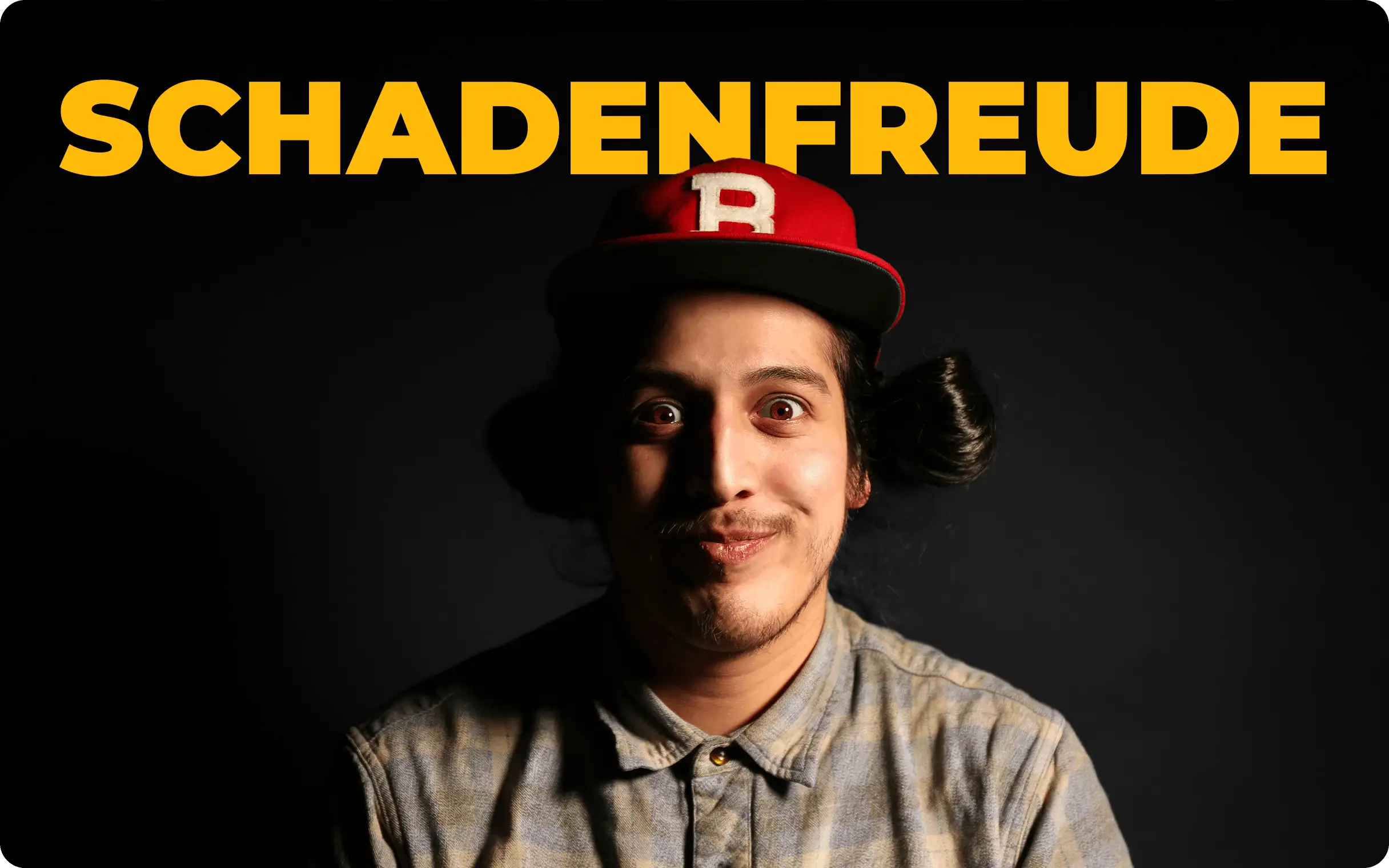 What does "Schadenfreude" mean in English?