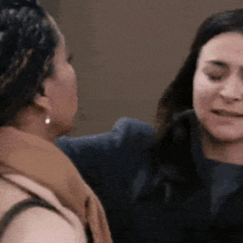 Two women embracing in comfort and support